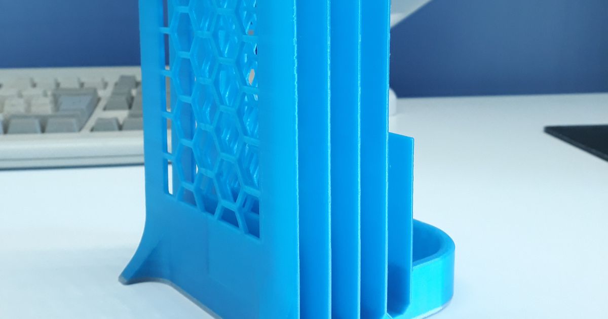 3D printed vertical document organizer holding papers and mail on a desk