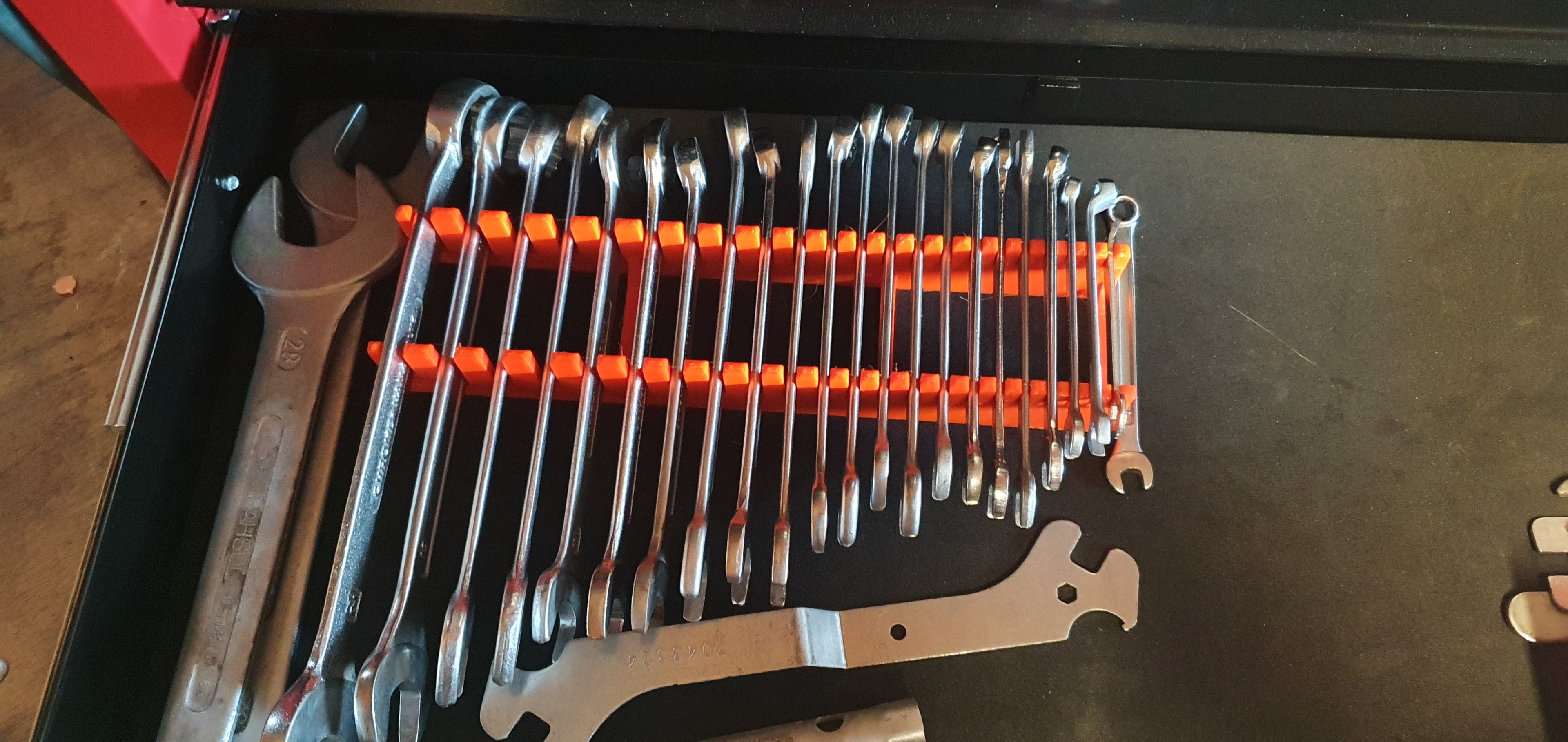 3D printed wrench holder organizer for metric wrench storage in a toolbox or tool cart