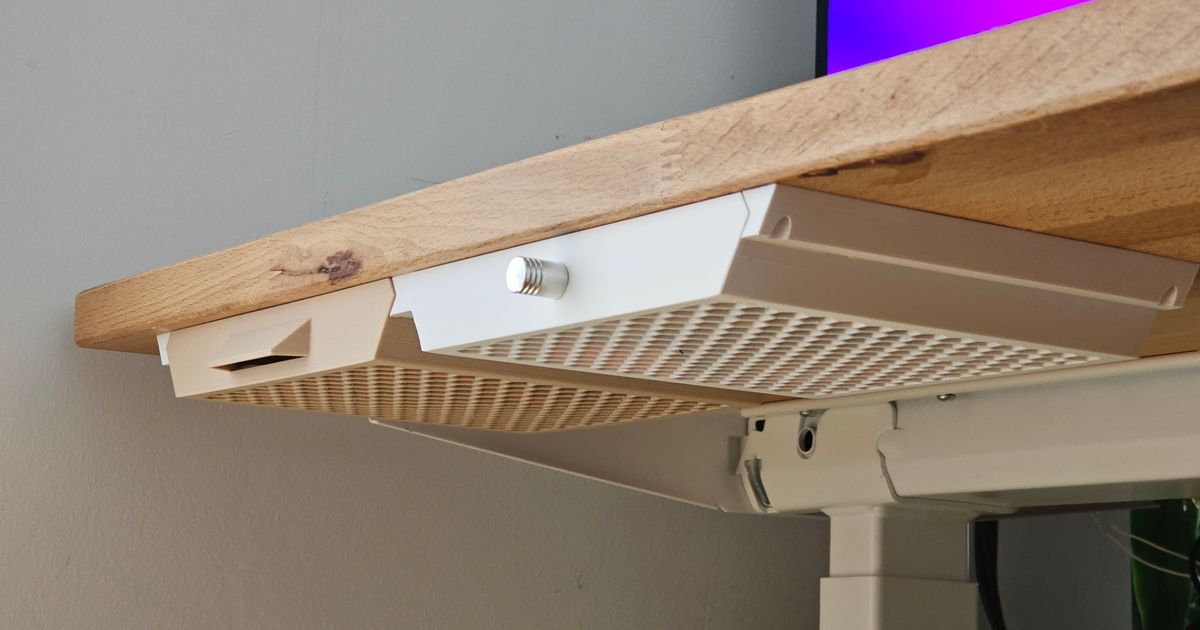 3D printed under desk drawer mounted below a desk for hidden storage of small office and workshop items
