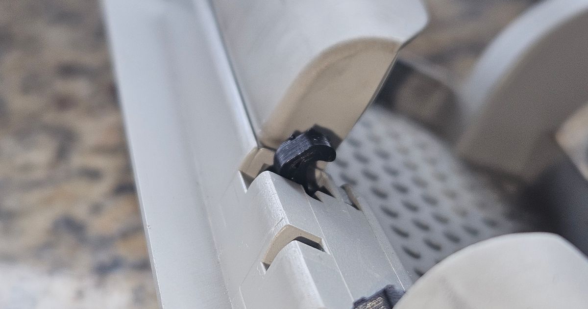3D printed replacement latch for a VW Amarok overhead sunglasses holder compartment