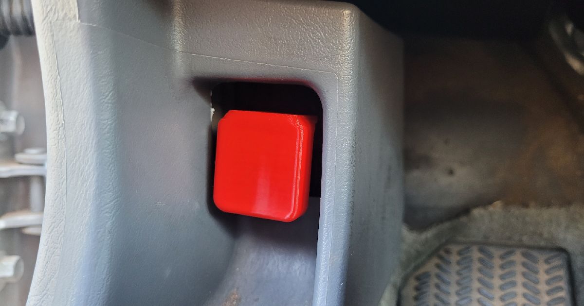 3D printed Honda Civic hood release latch repair part installed on a cracked interior hood pull handle