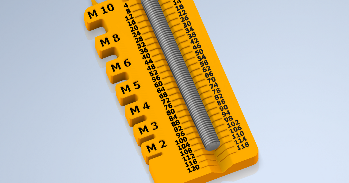 3D printed screw measuring tool gauge for checking metric screw size and length on a workbench