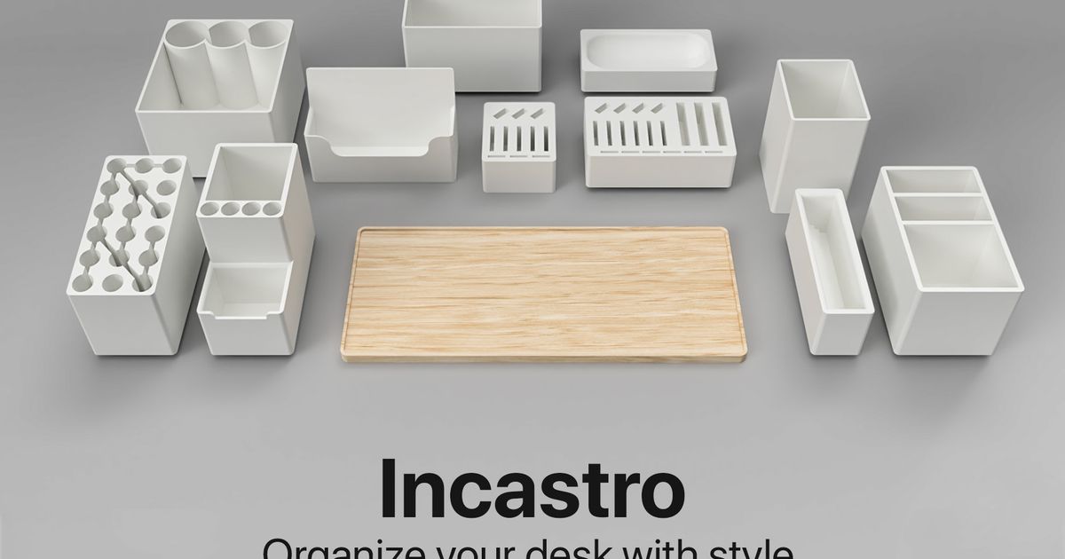 3D printed desk organizer holding pens, scissors, and small office items on a work surface