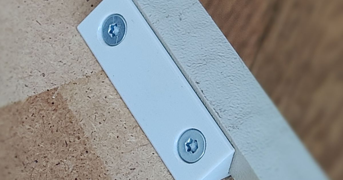 3D printed IKEA drawer support bracket repair installed on a damaged drawer back corner