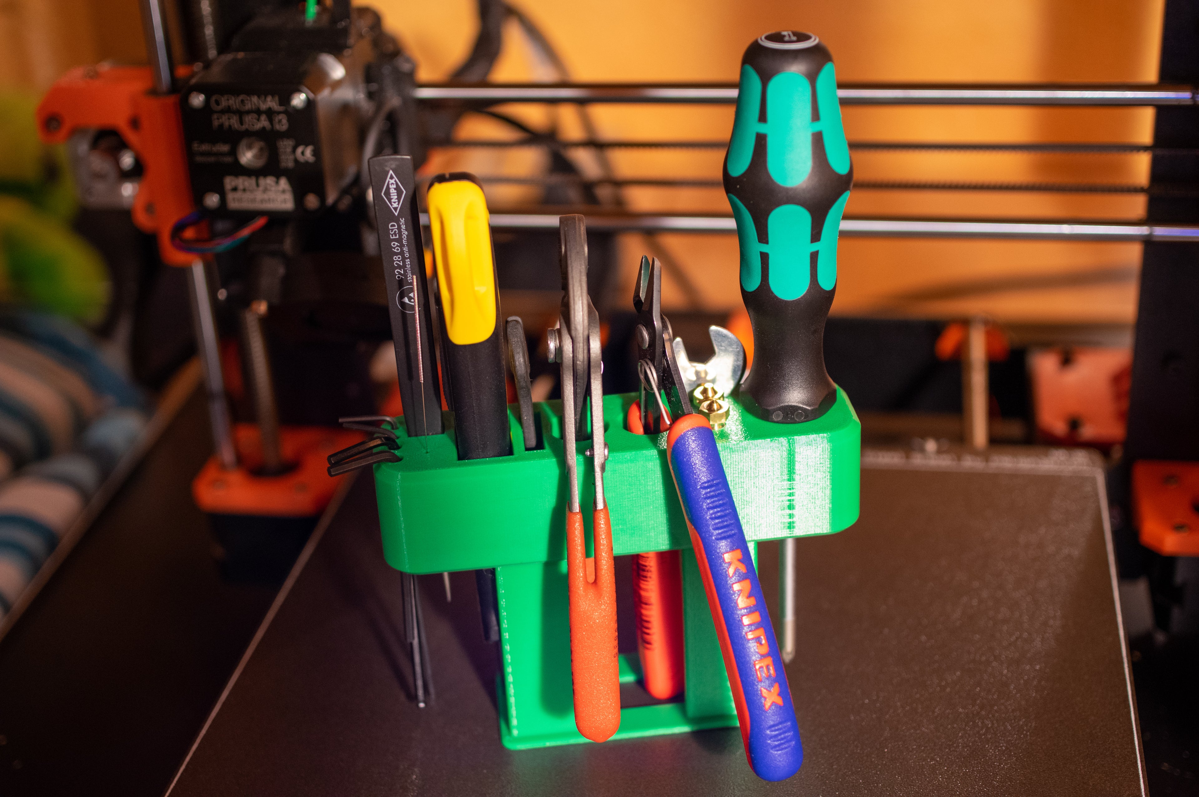 3D printed tool organizer holding common workshop tools, from the Printables model by Chriis