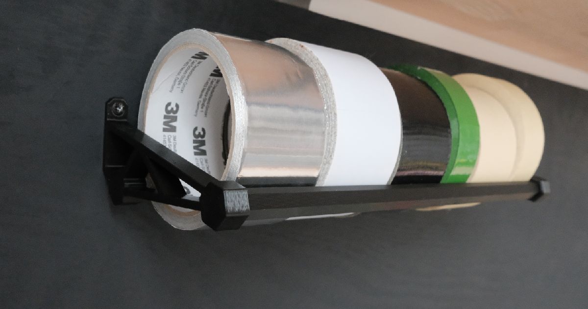 3D printed wall-mounted tape holder storing workshop and packing tape rolls on a wall