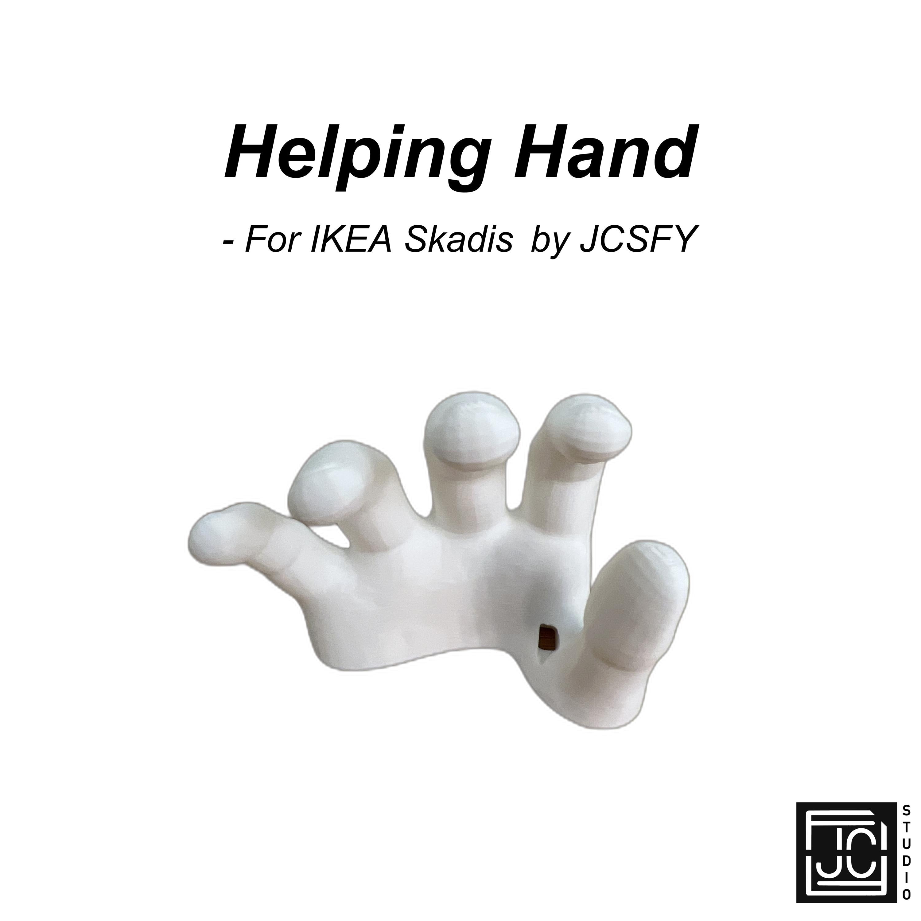 JCSFY helping-hand holder clipped onto an IKEA SKÅDIS pegboard