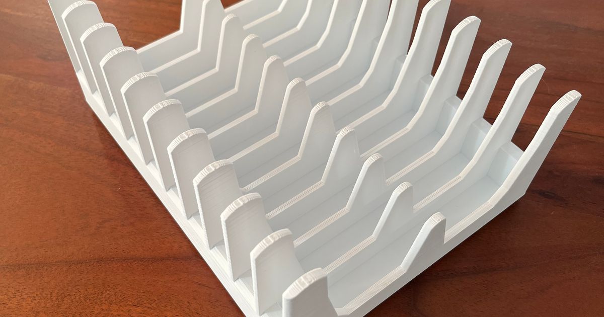 3D printed Gridfinity IKEA 365 plus lid holder organizing food container lids in a kitchen cabinet