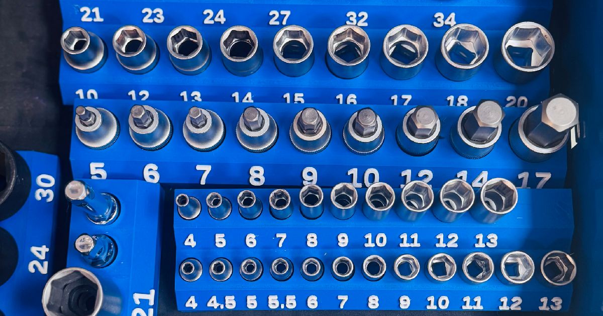 3D printed magnetic socket organizer holding sockets in a cleaner drawer layout for garage and workbench use