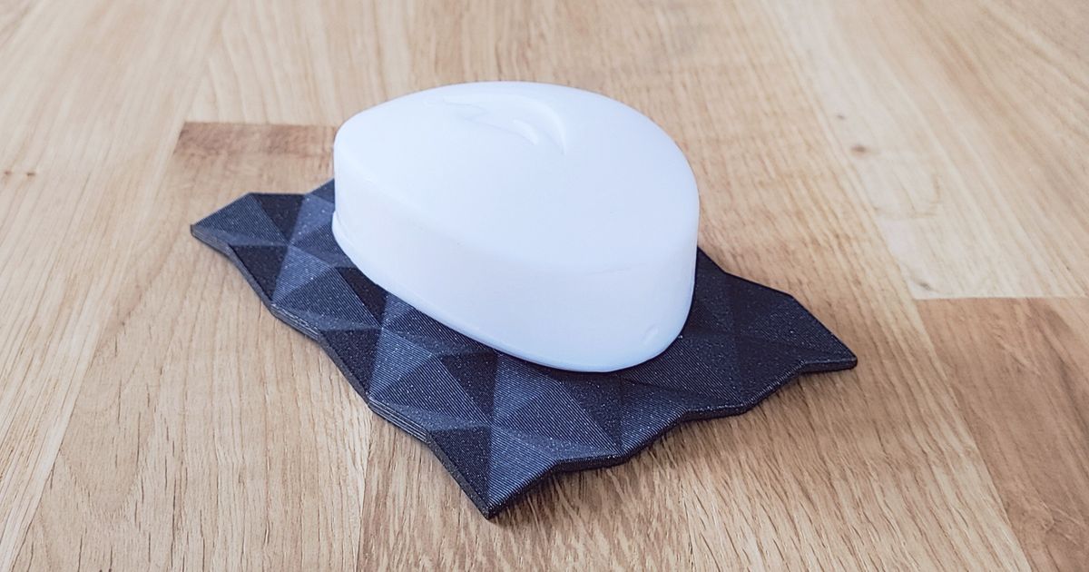 3D printed draining soap dish on a sink edge for bar soap storage and faster drying