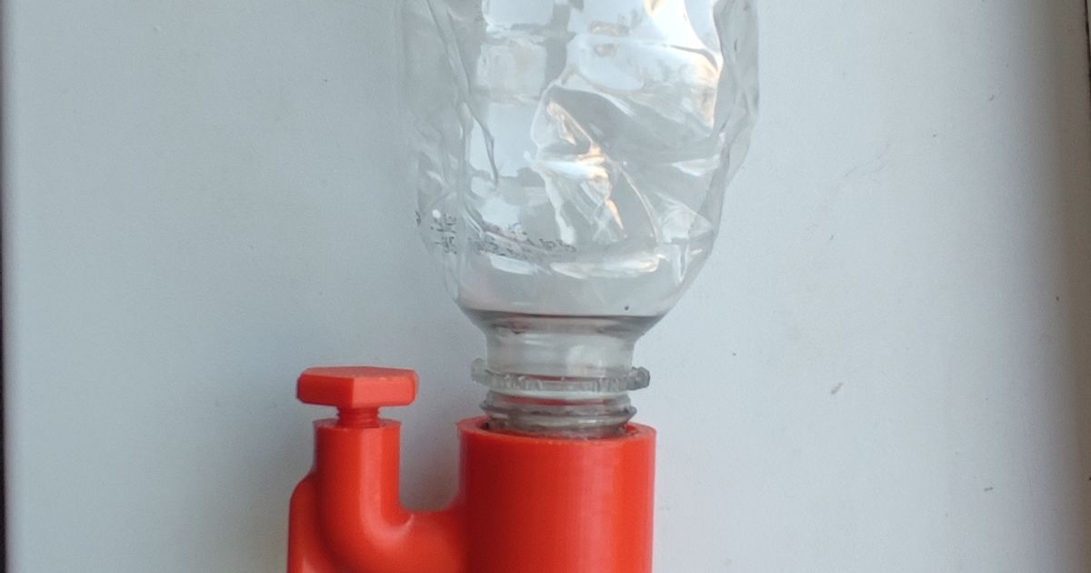 3D printed PET bottle watering adapter used as a slow-drip irrigation tool for potted plants