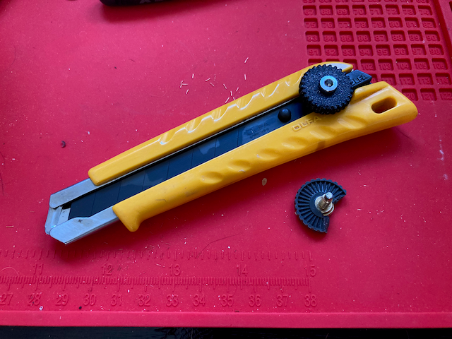 3D printed replacement knob for an OLFA L-1 utility knife shown installed on the tool