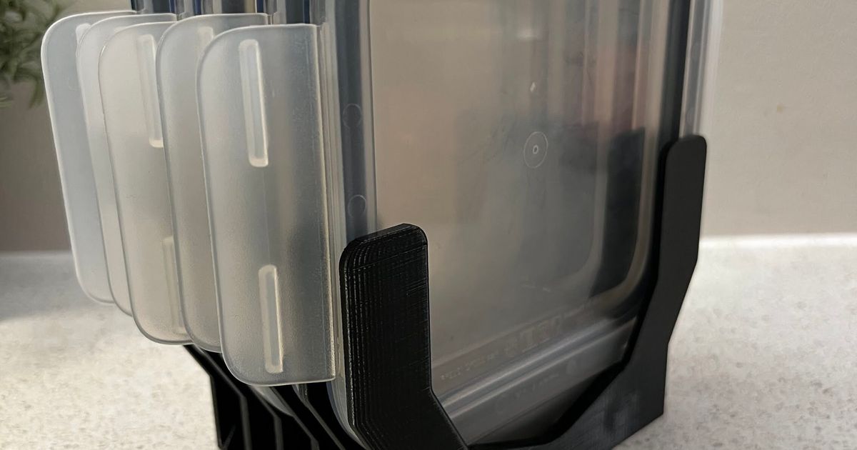 3D printed IKEA 365+ lid holder organizing food-container lids upright on a kitchen shelf