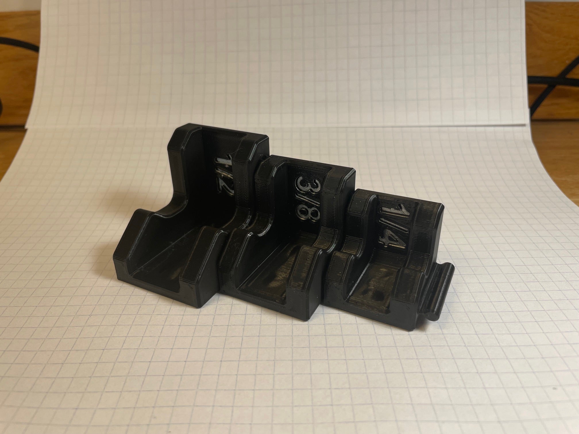 3D printed magnetic ratchet organizer holding common hand ratchets in a cleaner tool storage layout