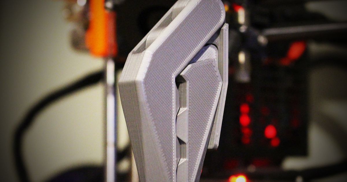 3D printed bag clip print-in-place cam design on a neutral background