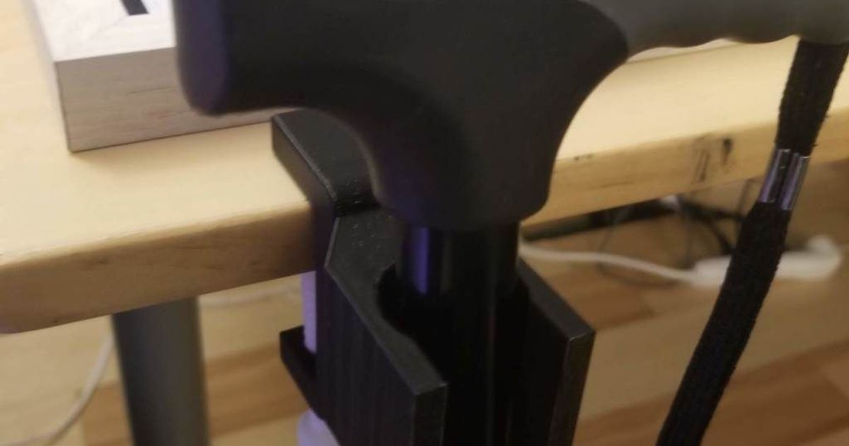 3D printed adjustable cane holder mounted to a mobility aid to keep a cane within reach
