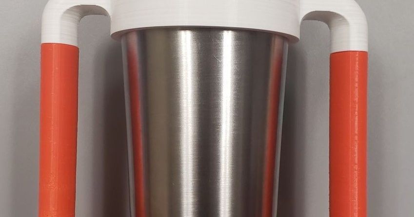 3D printed accessibility cup handle attached to a cup for easier one-handed grip