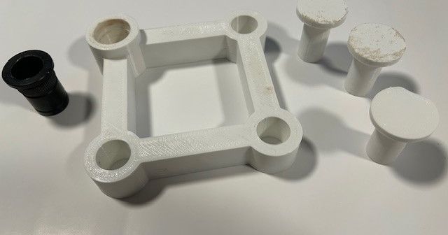 3D printed dog hole drilling jig for MFT-style workbench layouts