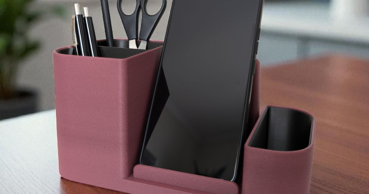 3D printed desk organizer with compartments and an integrated phone holder