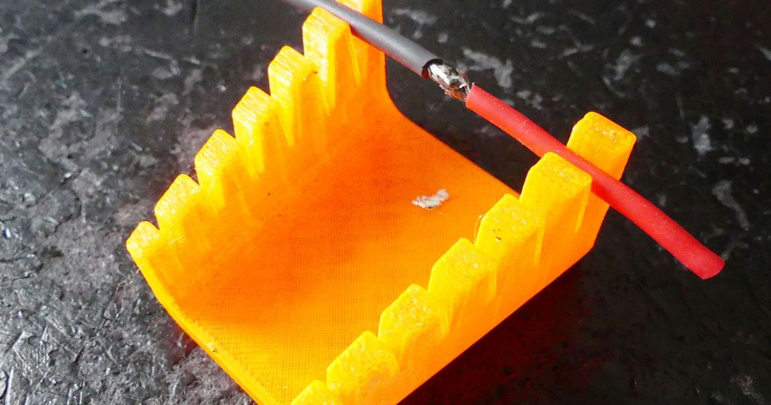 3D printed cable soldering jig holding wires for bench repair work