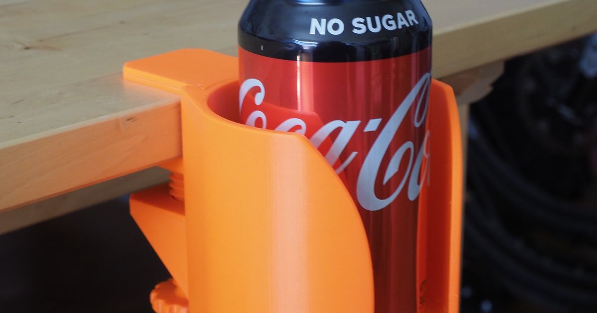 3D printed under-desk cup holder mounted below a desk to keep drinks off the main work surface