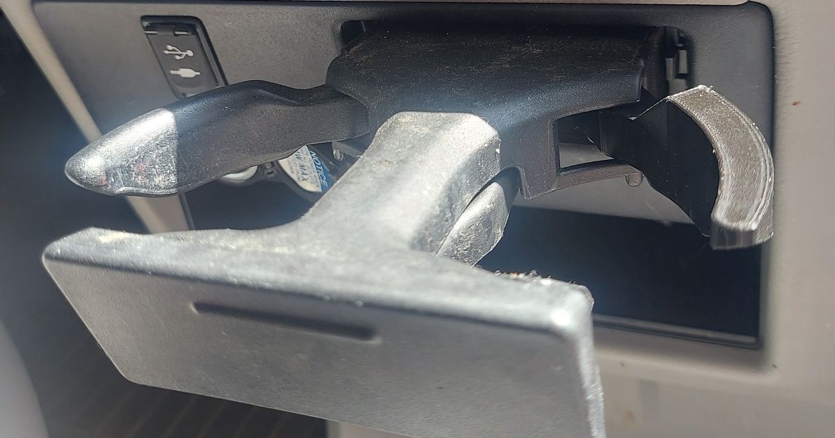 3D printed Toyota Sienna cup holder arm replacement for restoring a broken dashboard cup holder support