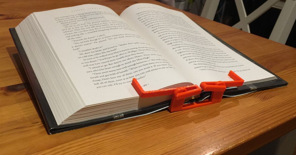 3D printed hands-free book holder clamping a book open for recipes, study, or desk reference