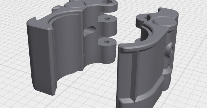 3D printed wheelchair clamp mounted on a round frame tube for accessory attachment
